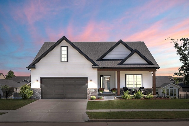 2621 Shale Rd, Normal, IL 61761 - modern farmhouse style home featuring a garage, a porch, concrete driveway, stone siding, and roof with shingles