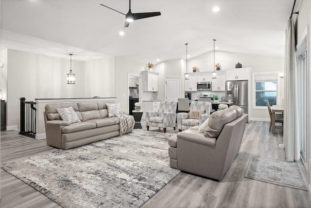 2621 Shale Rd, Normal, IL 61761 - living room with vaulted ceiling, light wood-style floors, ceiling fan, and recessed lighting