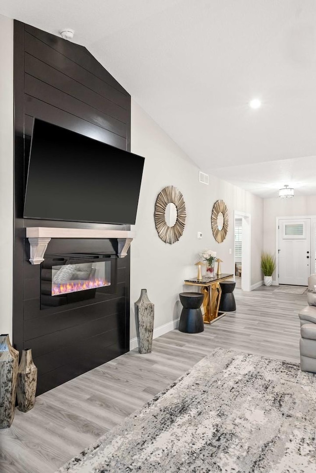 2621 Shale Rd, Normal, IL 61761 - living area with a fireplace, wood finished floors, and recessed lighting
