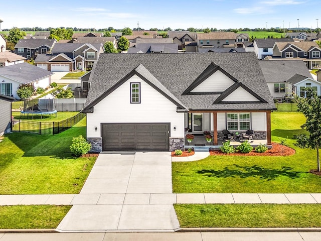 2621 Shale Rd, Normal, IL 61761 - view of front of property featuring a shingled roof, a residential view, an attached garage, concrete driveway, and stone siding