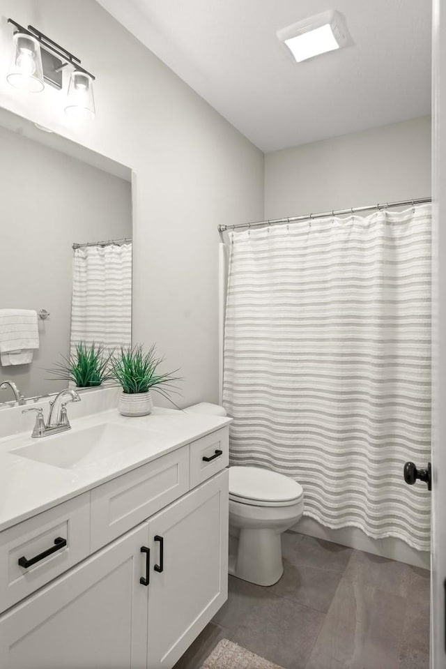 2621 Shale Rd, Normal, IL 61761 - bathroom featuring vanity and toilet