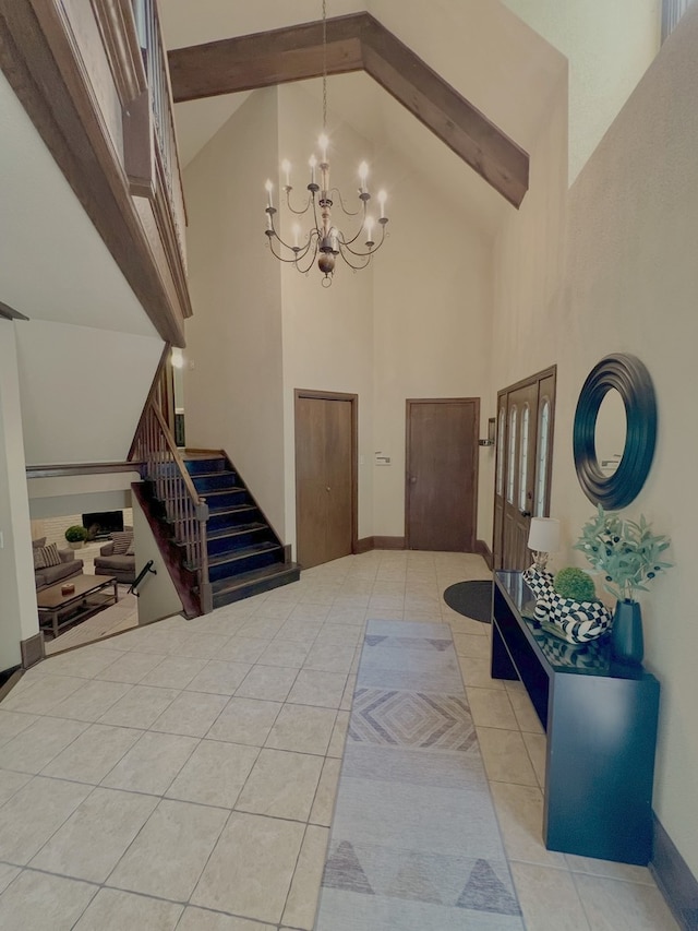 16612 S Catawba Rd, Homer Glen, IL 60491 - tiled foyer featuring high vaulted ceiling, a chandelier, stairway, and beam ceiling
