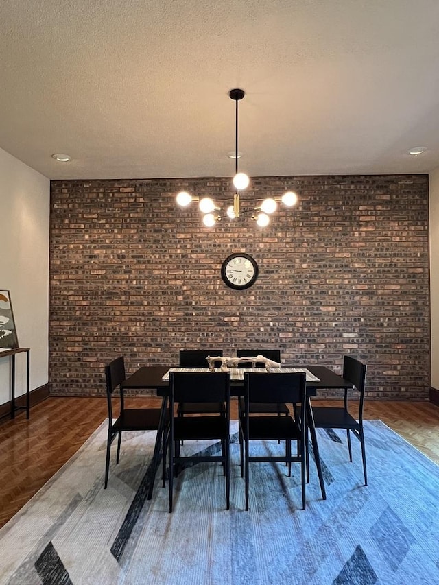 16612 S Catawba Rd, Homer Glen, IL 60491 - dining area with brick wall, wood finished floors, and a textured ceiling