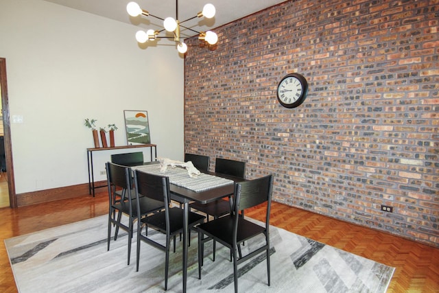 16612 S Catawba Rd, Homer Glen, IL 60491 - dining area with brick wall, a chandelier, and a high ceiling