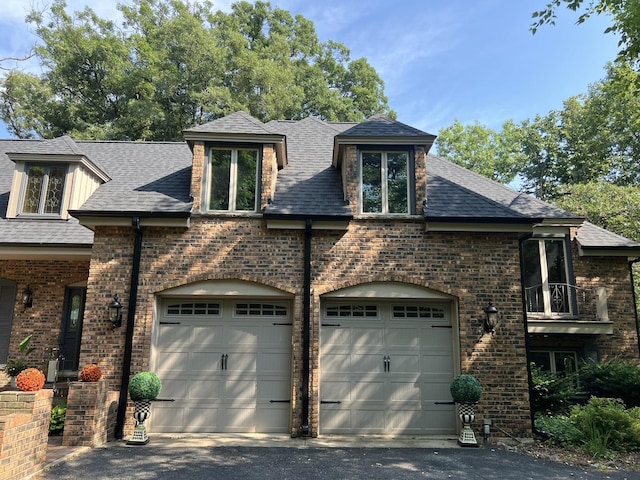 16612 S Catawba Rd, Homer Glen, IL 60491 - french provincial home with asphalt driveway, brick siding, an attached garage, and a shingled roof