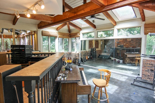 16612 S Catawba Rd, Homer Glen, IL 60491 - sunroom / solarium with a skylight, concrete floors, and a wood stove