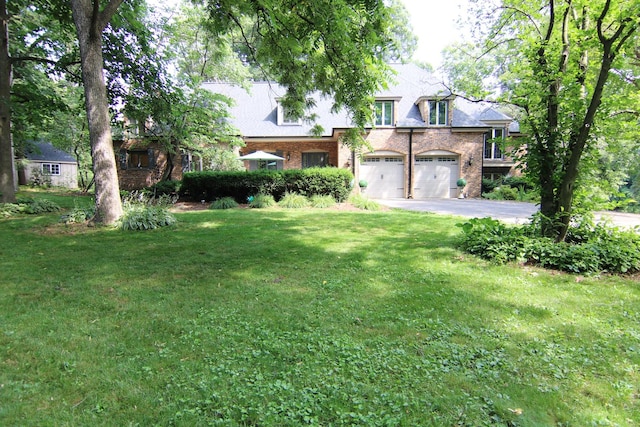 16612 S Catawba Rd, Homer Glen, IL 60491 - view of front of property featuring asphalt driveway, an attached garage, a front lawn, and brick siding