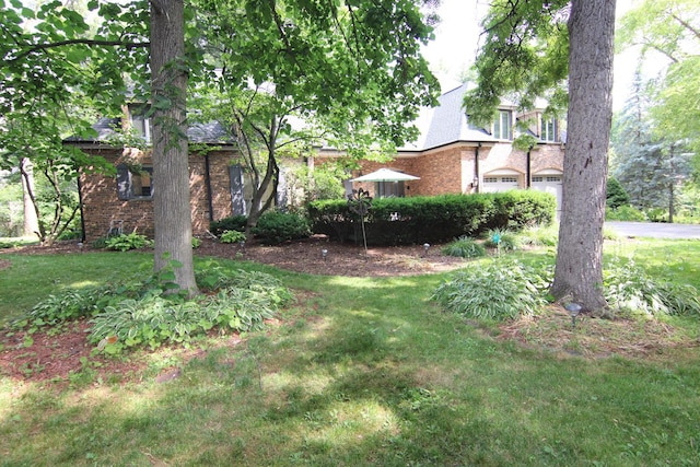 16612 S Catawba Rd, Homer Glen, IL 60491 - view of grassy yard with a garage