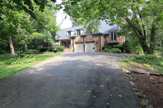 16612 S Catawba Rd, Homer Glen, IL 60491 - view of front of home with driveway, a garage, and brick siding