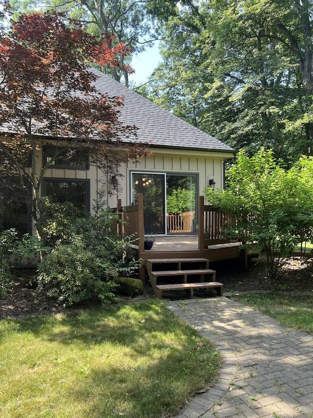 16612 S Catawba Rd, Homer Glen, IL 60491 - back of house featuring a shingled roof, a wooden deck, and board and batten siding