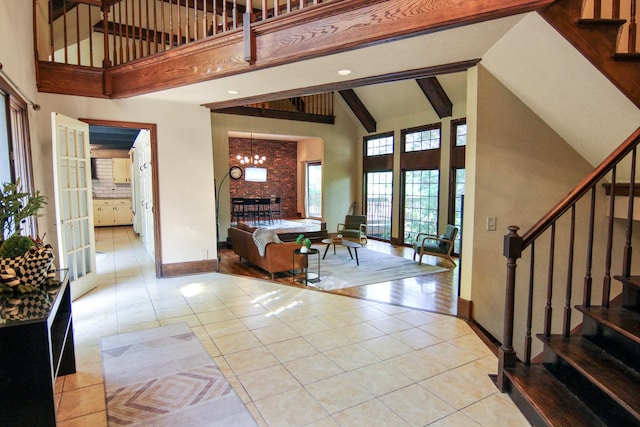 16612 S Catawba Rd, Homer Glen, IL 60491 - entryway featuring high vaulted ceiling, stairs, light tile patterned floors, a chandelier, and recessed lighting