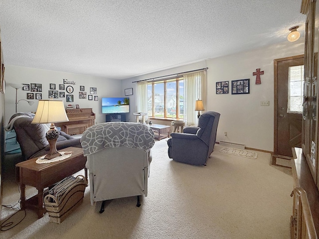 610 S 2nd Ave, Forreston, IL 61030 - living area with a textured ceiling, carpet flooring, and a baseboard heating unit