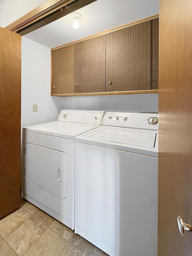 610 S 2nd Ave, Forreston, IL 61030 - laundry room with washer and dryer and cabinet space