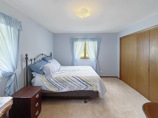 610 S 2nd Ave, Forreston, IL 61030 - carpeted bedroom featuring a closet