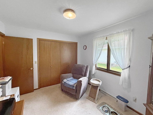 610 S 2nd Ave, Forreston, IL 61030 - living area with light colored carpet and a baseboard heating unit