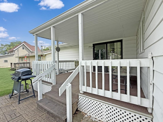 610 S 2nd Ave, Forreston, IL 61030 - doorway to property featuring a porch