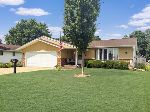 610 S 2nd Ave, Forreston, IL 61030 - single story home featuring brick siding, an attached garage, driveway, and a front lawn