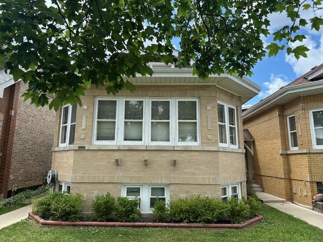 4540 N Menard Ave, Chicago, IL 60630 - view of side of property with a lawn