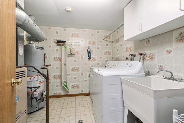 11020 S Keating Ave Unit 202, Oak Lawn, IL 60453 - laundry room with cabinet space, independent washer and dryer, water heater, tile walls, and light tile patterned floors