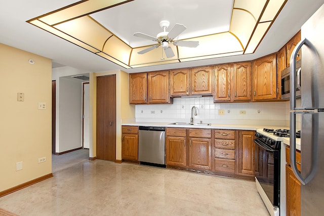 11020 S Keating Ave Unit 202, Oak Lawn, IL 60453 - kitchen featuring appliances with stainless steel finishes, brown cabinets, a ceiling fan, and decorative backsplash