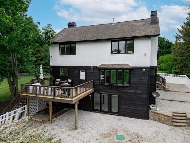 9N909 Koshare Trl, Elgin, IL 60124 - rear view of house with stairway, a chimney, roof with shingles, and a deck