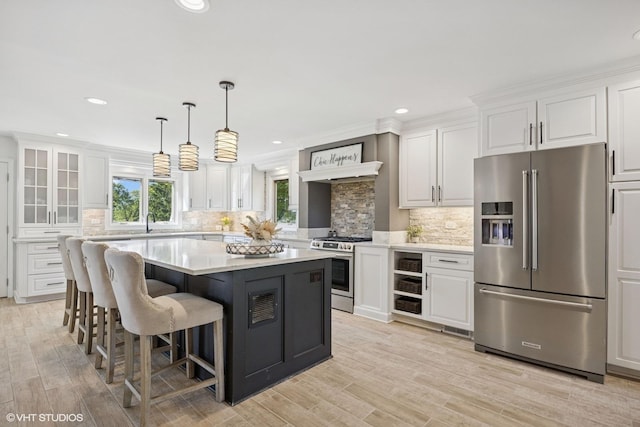 9N909 Koshare Trl, Elgin, IL 60124 - kitchen with stainless steel appliances, white cabinets, recessed lighting, and ornamental molding