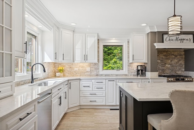 9N909 Koshare Trl, Elgin, IL 60124 - kitchen with appliances with stainless steel finishes, white cabinetry, ornamental molding, backsplash, and light stone countertops
