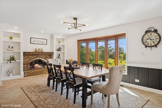 9N909 Koshare Trl, Elgin, IL 60124 - dining space with a chandelier, a fireplace, recessed lighting, and built in features