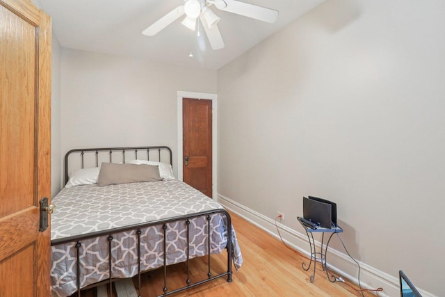 4702 N Campbell Ave Unit 2, Chicago, IL 60625 - bedroom featuring light wood finished floors and a ceiling fan