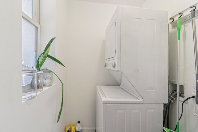 4702 N Campbell Ave Unit 2, Chicago, IL 60625 - laundry room featuring estacked washer and dryer