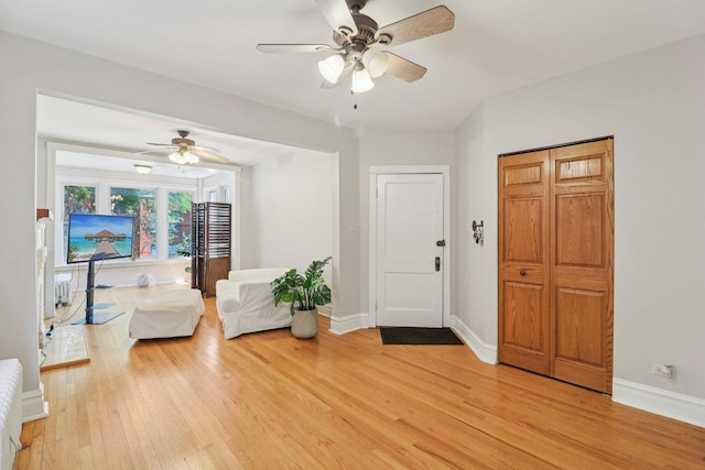 4702 N Campbell Ave Unit 2, Chicago, IL 60625 - foyer entrance featuring light wood-type flooring and ceiling fan