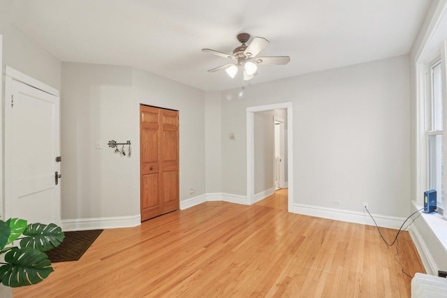 4702 N Campbell Ave Unit 2, Chicago, IL 60625 - empty room featuring light wood-style flooring and a ceiling fan