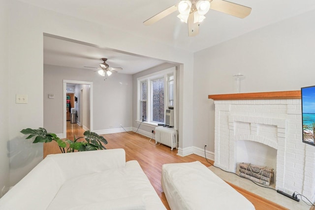4702 N Campbell Ave Unit 2, Chicago, IL 60625 - living area featuring a ceiling fan, radiator, and light wood-type flooring