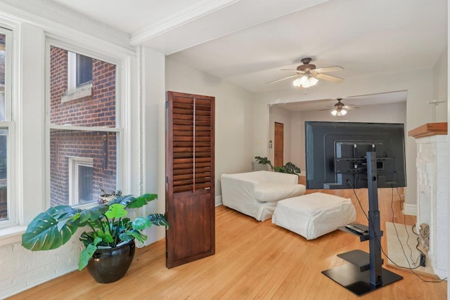 4702 N Campbell Ave Unit 2, Chicago, IL 60625 - bedroom with wood finished floors and a brick fireplace