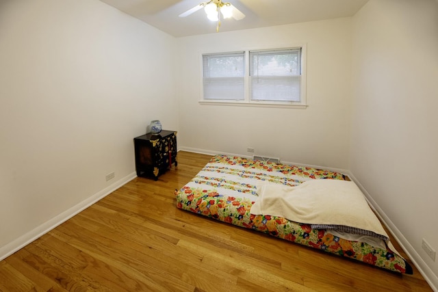 1065 Irwin Ave, Des Plaines, IL 60018 - bedroom with wood finished floors and a ceiling fan