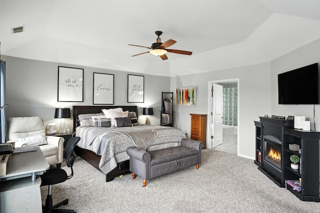 3705 Streamwood Dr, Hazel Crest, IL 60429 - bedroom featuring carpet floors, vaulted ceiling, ceiling fan, a raised ceiling, and a glass covered fireplace