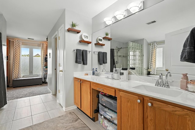 3705 Streamwood Dr, Hazel Crest, IL 60429 - full bath featuring double vanity, tiled shower, and tile patterned flooring