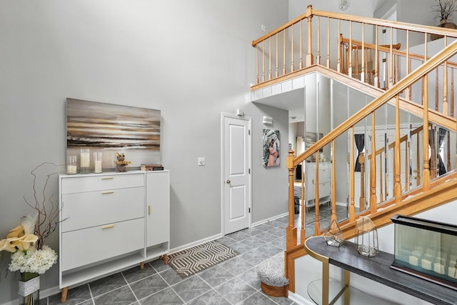 3705 Streamwood Dr, Hazel Crest, IL 60429 - entryway featuring stairs, a towering ceiling, and tile patterned flooring