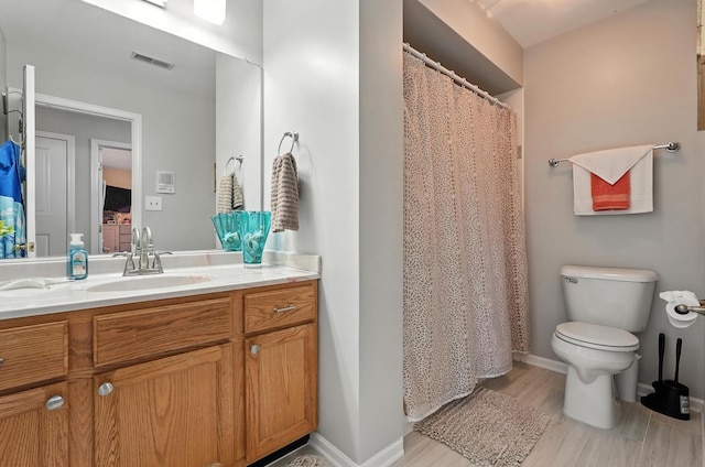 3705 Streamwood Dr, Hazel Crest, IL 60429 - full bath featuring vanity, wood finished floors, and a shower with shower curtain