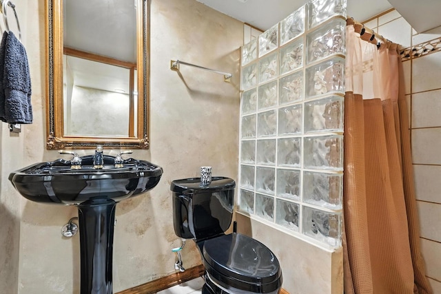 3705 Streamwood Dr, Hazel Crest, IL 60429 - bathroom featuring toilet and a shower with shower curtain