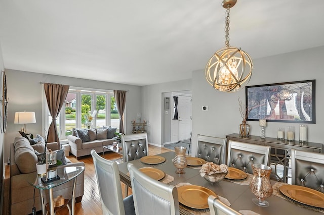 3705 Streamwood Dr, Hazel Crest, IL 60429 - dining area featuring a chandelier and wood finished floors
