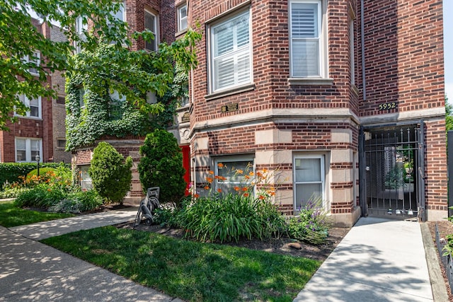 5952 N Paulina St Unit 2N, Chicago, IL 60660 - view of exterior entry featuring brick siding