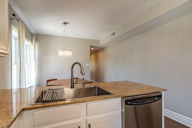 5952 N Paulina St Unit 2N, Chicago, IL 60660 - kitchen with stainless steel dishwasher, white cabinetry, decorative light fixtures, light stone counters, and dark wood-type flooring