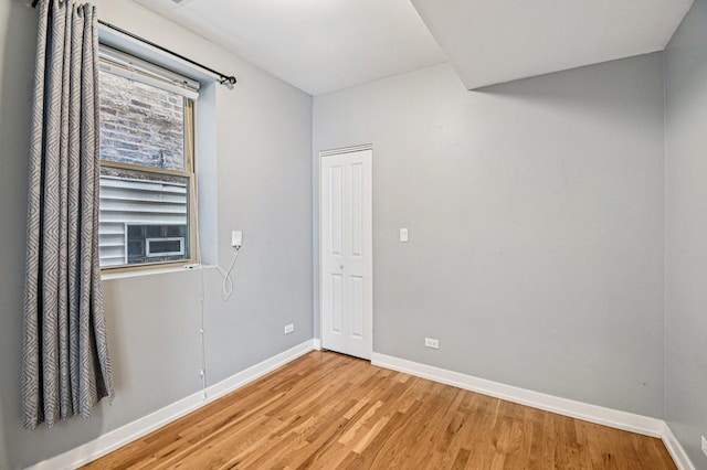 2423 W Augusta Blvd Unit 1, Chicago, IL 60622 - spare room with baseboards and light wood-type flooring
