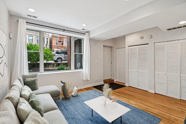 2423 W Augusta Blvd Unit 1, Chicago, IL 60622 - living area with wood finished floors and recessed lighting