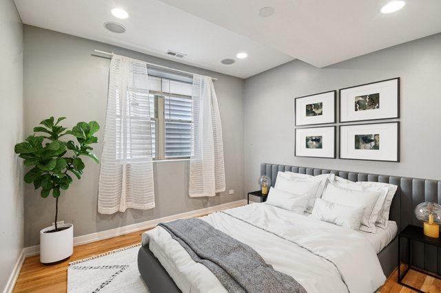 2423 W Augusta Blvd Unit 1, Chicago, IL 60622 - bedroom featuring wood finished floors and recessed lighting