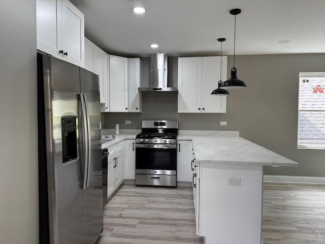 653 N Spaulding Ave, Chicago, IL 60624 - kitchen with appliances with stainless steel finishes, wall chimney exhaust hood, a peninsula, light wood-style floors, and recessed lighting