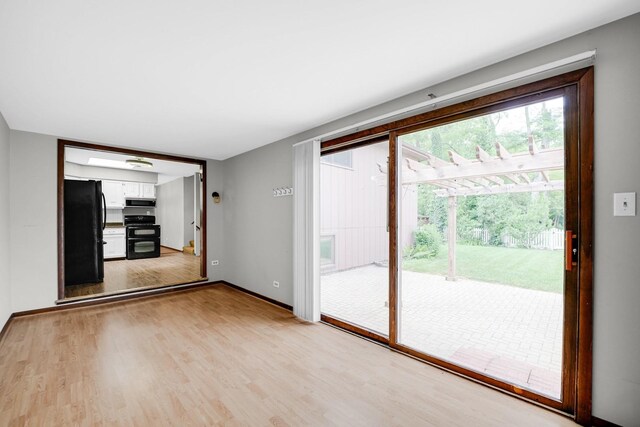 17720 Ashland Ave, Homewood, IL 60430 - spare room with light wood-type flooring and baseboards