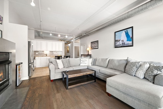 1301 W Madison St Unit 207, Chicago, IL 60607 - living area with dark wood-type flooring
