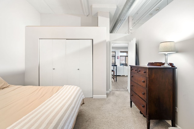 1301 W Madison St Unit 207, Chicago, IL 60607 - bedroom with light colored carpet and a closet
